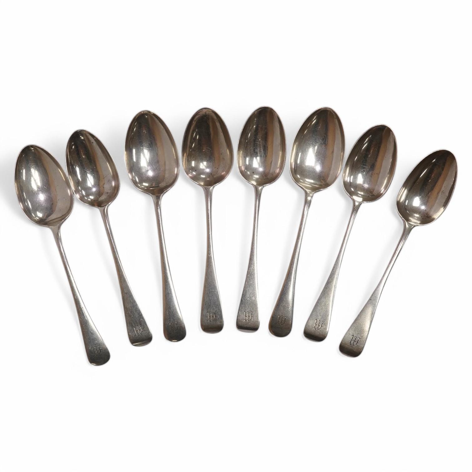 Five Victorian silver Old English pattern dessert spoons, by George Adams, London, 1880 and three other matched dessert spoons by Roberts & Dore, Sheffield, 1931, 11.6oz. Condition - fair